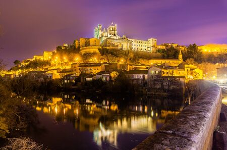 St. Nazaire Cathedral as seen from the Pont Vieux - Beziers, Franceのeditorial素材