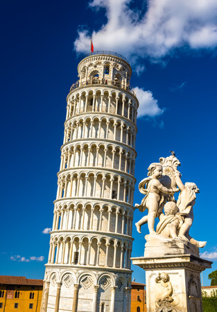 Fontana dei Putti and the Leaning Tower - Pisa, Italyの写真素材
