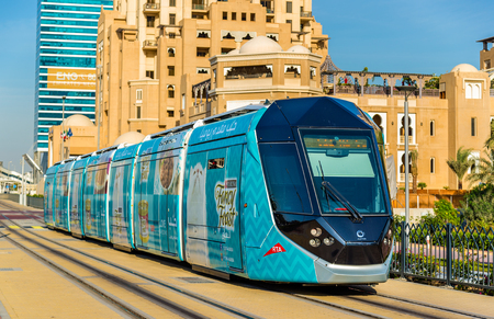 DUBAI, UAE - DECEMBER 31: Alstom Citadis 402 tram on December 31, 2015 in Dubai, UAE. The system is wireless as it uses a ground-level power supplyのeditorial素材