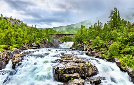 Voringsfossen waterfall on the Bjoreia river in Hordaland, Norwayの写真素材