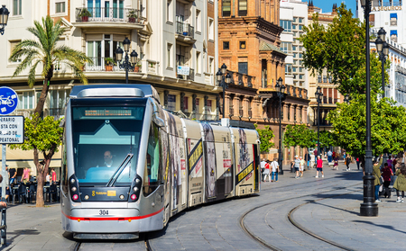 Seville, Spain - November 1, 2016: MetroCentro tram on Avenida de la Constitucion. These trams are able to run without overhead wireのeditorial素材