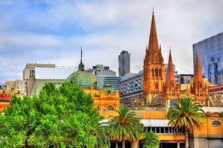 Flinders Street Station and St Pauls Cathedral in Melbourneの写真素材