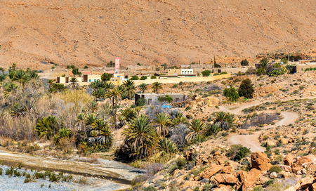 A village with traditional kasbah houses in Ziz Valley, Moroccoの写真素材