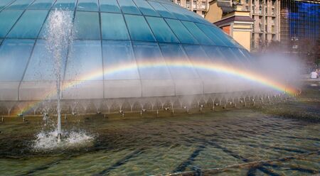 Rainbow in a fountain. Kiev, Ukraine