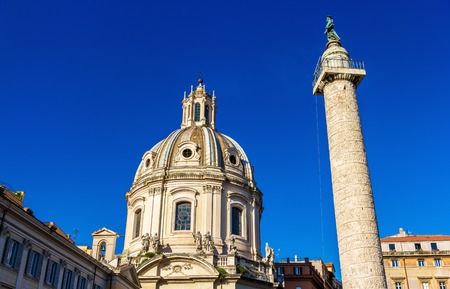 Trajan's Column and Santissimo Nome di Maria al Foro Traiano Church in Rome, Italyの写真素材