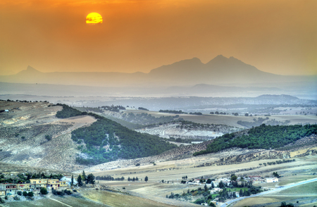 Sunset above hills in North-West Tunisia near Le Kefの写真素材