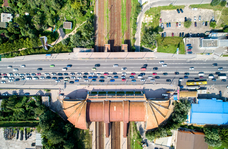Top-down view of a road bridge crossing a railway. Karavaevi Dachi, Kiev, Ukraineの写真素材