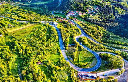 Aerial view of a winding road in Sloveniaの写真素材