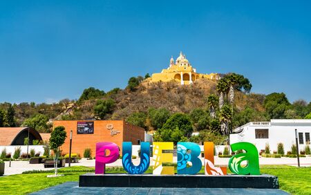 Sign Puebla and the Church of Our Lady of Remedies, Mexicoのeditorial素材