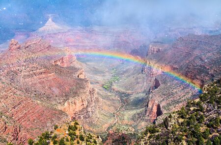 Rainbow above the Grand Canyon in Arizona, USAの写真素材