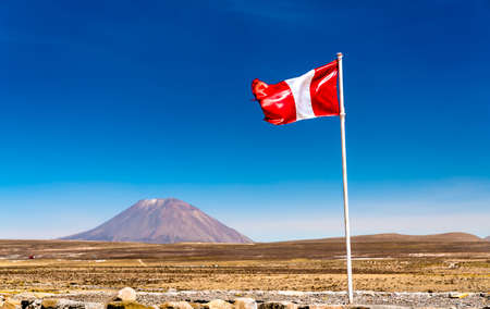 Flag of Peru and Misti volcano in the Arequipa regionの写真素材