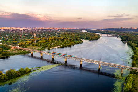 Train on the Petrovsky Railway Bridge in Ukraineの写真素材