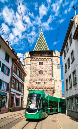 Spalentor historic city gate and a tram in Basel, Switzerlandの写真素材