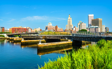 Footbridge with skyline of Downtown Providence on the Providence river in Rhode Island, United Statesの写真素材