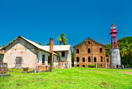Lighthouse at a former penal colony at Ile Royale, the Salvation Islands in French Guiana, South Americaの写真素材