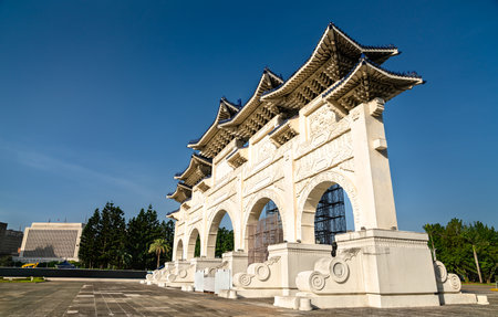 Liberty Square Arch in Taipei, Taiwan, with traditional blue-tiled roof and clear sky