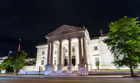 Memorial Continental Hall, headquarters of the Daughters of the American Revolution (DAR), in Washington, D.C. The historic neoclassical building is illuminated at nightの写真素材