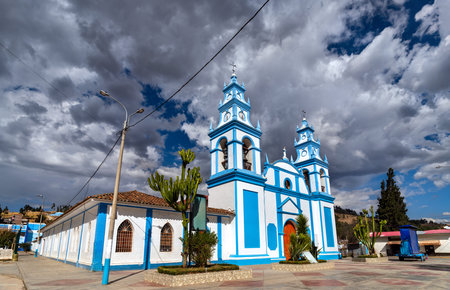 Immaculate Conception Church in Concepcion, Junin, Peru. The white and blue colonial-style building...