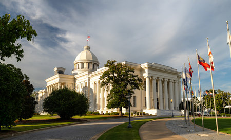 Scenic exterior view of the historic white dome and classical architecture of the Alabama State Capitol building in Montgomery, Alabama, United States.の写真素材