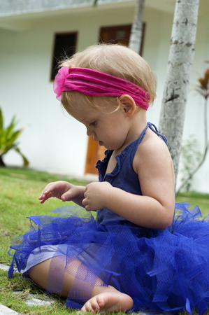cute baby-girl in tutu skirt .の写真素材