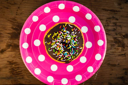 Bright donut on the plate.の写真素材