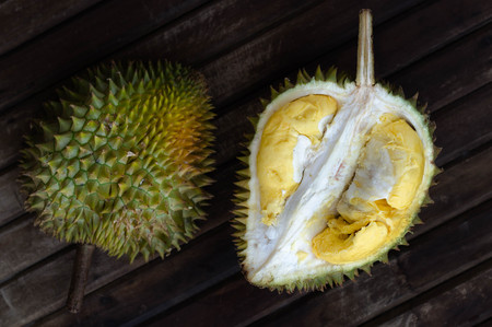 Durian fresh yellow  fruit on wooden backgroundの写真素材