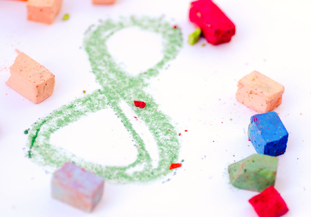 Number 8 drawn with bright chalk on white.の写真素材