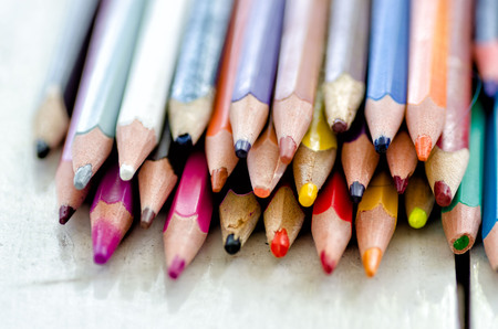 Bunch of used color pencils, broken tips.の写真素材