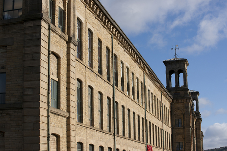 View of Salt's logo on Salts Mill, a UNESCO world heritage site in Saltaire, Bradford, West Yorkshire. October, 2013のeditorial素材