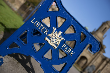 Lister Park bench with Bradford Council crest and insignia outside Cartwright Hall Museum and Art Galleryのeditorial素材