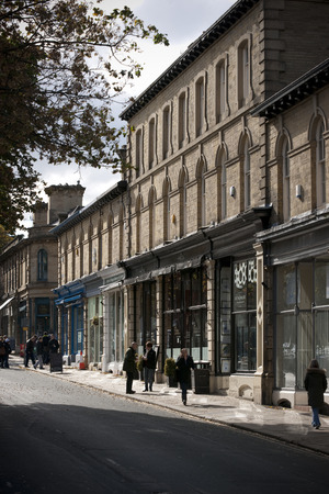 View of Victoria Road in shopping street in Saltaire, Bradford, West Yorkshire. October, 2013のeditorial素材