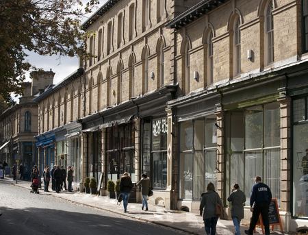 View of Victoria Road in shopping street in Saltaire, Bradford, West Yorkshire. October, 2013のeditorial素材