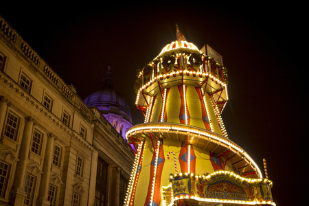 A view of the town hall and helter skelter at Nottingham Christmas Market in the Old Market Square, Nottingham, Nottinghamshire - 30th November 2017のeditorial素材