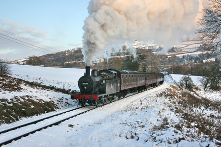 Jinty Steam Locomotive on a Santa Special at the Keighley and Worth Valley Railway, Oakworth, West Yorkshire, UK - January 2010のeditorial素材