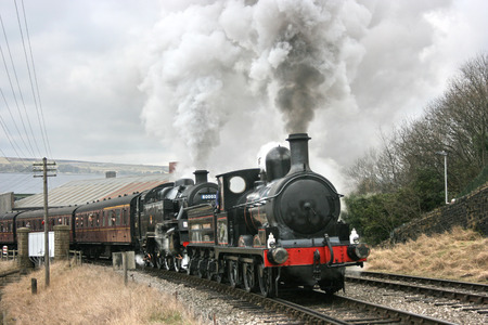 Lancashire and Yorkshire Steam Loco and Standard 4 steam loco at the Keighley and Worth Valley Railway - Keighley, West Yorkshire, UK - 14th February 2010のeditorial素材