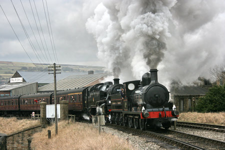 Lancashire and Yorkshire Steam Loco and Standard 4 steam loco at the Keighley and Worth Valley Railway - Keighley, West Yorkshire, UK - 14th February 2010のeditorial素材