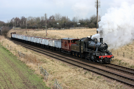 Standard 78019 steam loco with the windcutter train at the Great Central Railway Heritage Steam Railway, Loughborough, Leicestershire, United Kingdom - 21st March 2010.のeditorial素材