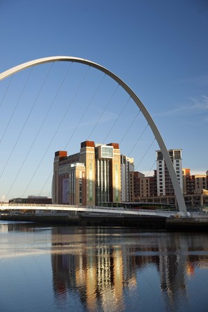 View of the Gateshead Millenium Bridge with the Baltic Contemporary Art Gallery building  in the background - Newcastle and Gateshead, UK - 5th November 2012のeditorial素材