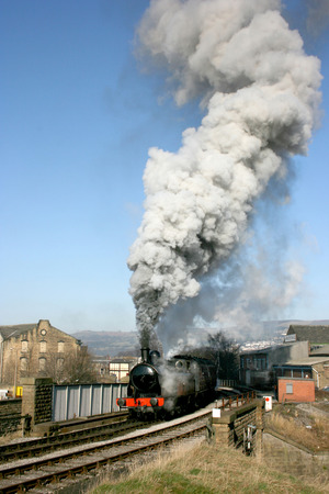 Taff Vale steam loco number 85 departs Keighley, Keighley and Worth Valley Railway, West Yorkshire, UK - February 2008のeditorial素材