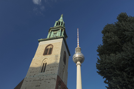 Berlin, Germany - 17th August 2018: Marienkirche and the Fernsehturm TV Tower near Alexanderplatzのeditorial素材