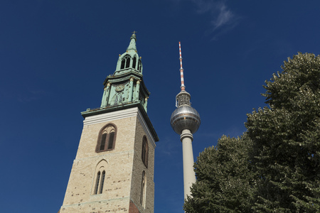 Berlin, Germany - 17th August 2018: Marienkirche and the Fernsehturm TV Tower near Alexanderplatzのeditorial素材