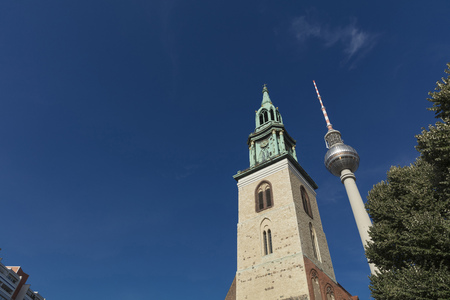 Berlin, Germany - 17th August 2018: Marienkirche and the Fernsehturm TV Tower near Alexanderplatzのeditorial素材
