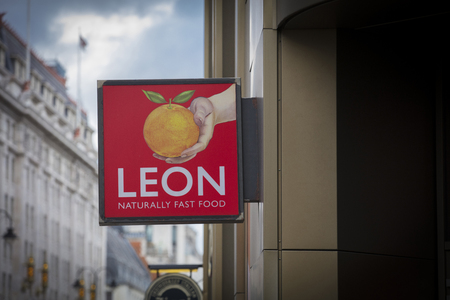 London, Greater London, United Kingdom, 7th February 2018, A sign and logo for Leon fast food cafeのeditorial素材