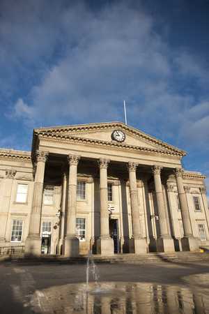 Huddersfield, West Yorkshire, UK, October 2013, the facade of Huddersfield Railway Stationのeditorial素材