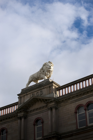 Huddersfield, West Yorkshire, UK, October 2013, lion statue on Lion Arcade, John William Street, Huddersfieldのeditorial素材