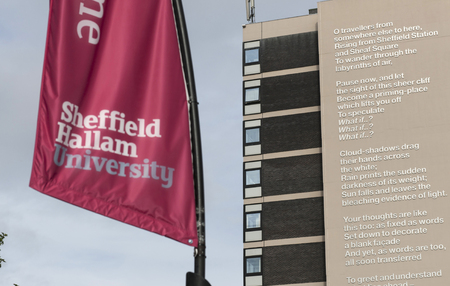 Poet Laureate Andrew Motion's poem What If? on the side of the Owen Building at Sheffield Hallam University, Sheffield, UK - September 2013のeditorial素材