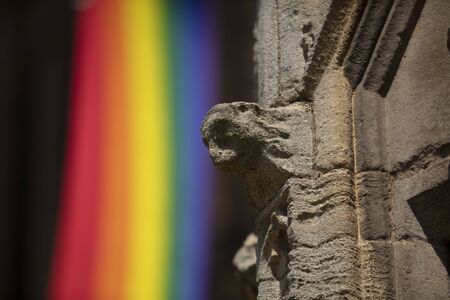 Peterborough, Cambridgeshire, United Kingdom, July 2019, A view of a Pride flag hanging from Peterborough Cathedralのeditorial素材