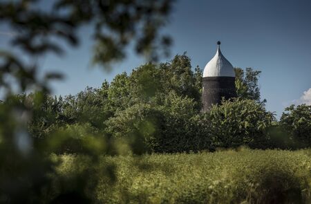 Lincolnshire, East Midlands, UK, May 2019, View of the lincolnshire countryside and an old windmill near Gainsboroughの写真素材
