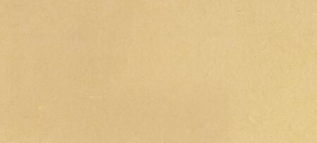 A fibrous paper with lots of texture in beigeの写真素材