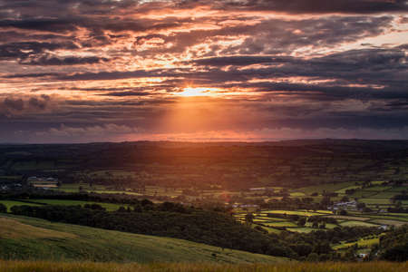 Llanllwni, Carmarthenshire, Wales, View from Llanllwni Mountain of sunsetの写真素材